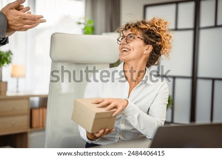 Similar – Image, Stock Photo Young man brings a Christmas tree from winter forest overcoming snowdrifts and snowfall. Christmas holidays.