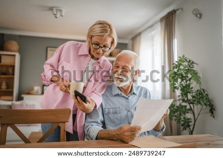 Similar – Image, Stock Photo Happy couple looking at each other on beach