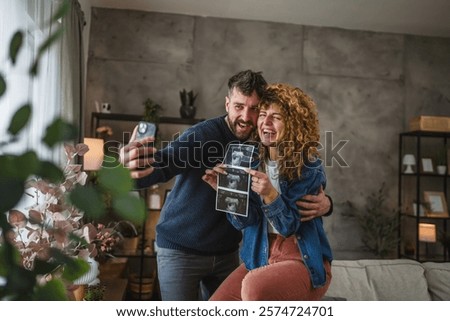 Similar – Image, Stock Photo Delighted couple hugging during sunset in nature