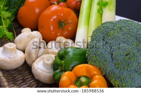Fresh vegetables mushrooms, tomatoes, leak, cauliflower, lemons, broccoli and pepper,