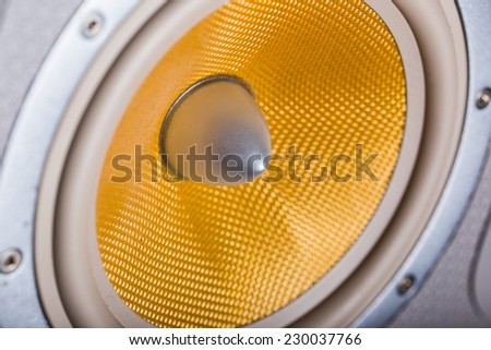 close up of orange audio speaker