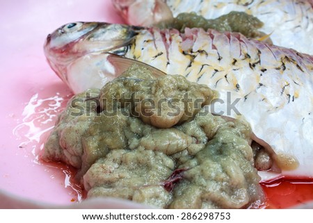 Fresh fish Silver barb roe (fish eggs) in plastic dish