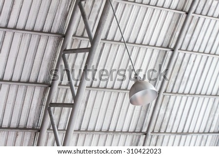 light lamp on steel pipe truss metal sheet roofing :  industrial electrical work