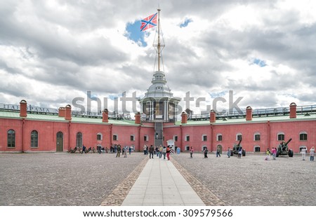 SAINT PETERSBURG, RUSSIA - JUNE 17, 2015: Naryshkin Bastion and Flag Tower  of Peter and Paul Fortress on Neva River.