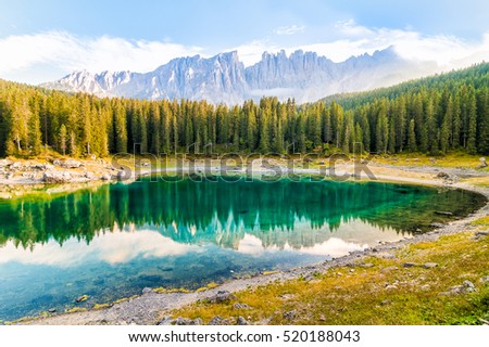 Landscape of Lake Carezza o Karersee and Dolomites in background, Nova Levante, Bolzano, Italy Foto stock © 