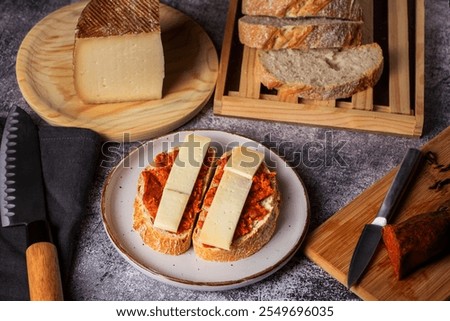 Similar – Image, Stock Photo Sobrasada with bread and parmesan typical mallorca spain