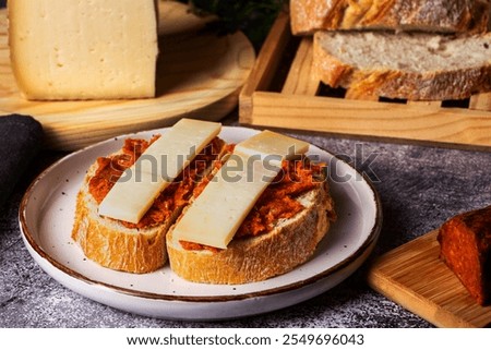 Similar – Image, Stock Photo Sobrasada with bread and parmesan typical mallorca spain