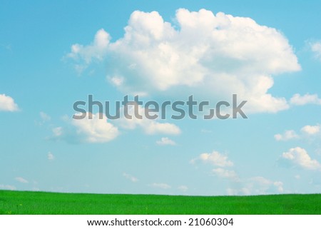 Green filed,blue sky and white clouds.