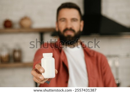 Similar – Image, Stock Photo caucasian doctor man holding test tube with blood for 2019-nCoV analyzing. Chinese Coronavirus blood test concept. Covid-2019