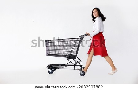 Similar – Image, Stock Photo Woman with shopping cart in the shop