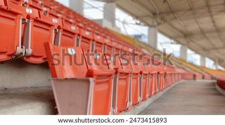 Similar – Image, Stock Photo Row of seats in the theatre with focus on one armrest