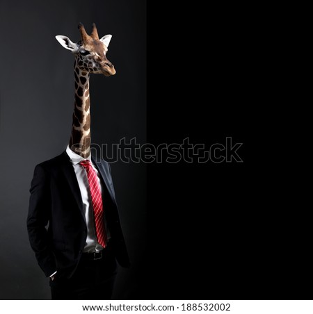Business concept with businessman with head of Giraffe
