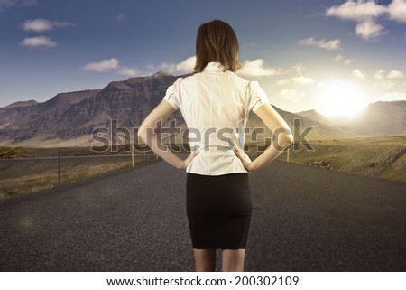 Businessman walking on journey to success as a business metaphor for entrepreneurship