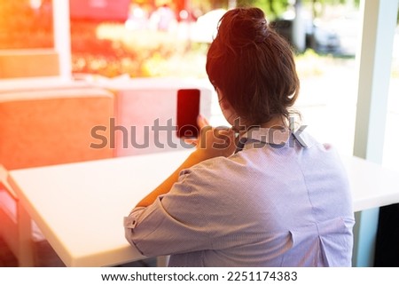 Similar – Foto Bild Anonyme Frau mit Kaffeetasse im Café