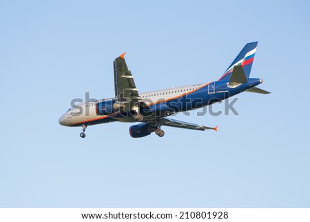 Moscow, Russia - July 13, 2014: The airline Airbus A321 plane Aeroflot sits down at the Sheremetyevo airport