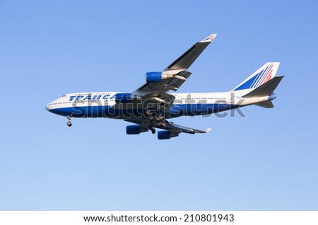 Moscow, Russia - July 13, 2014: The Boeing-747 plane of Transaero airline sits down at the Sheremetyevo airport