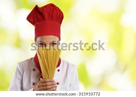 cook female chef in spaghetti