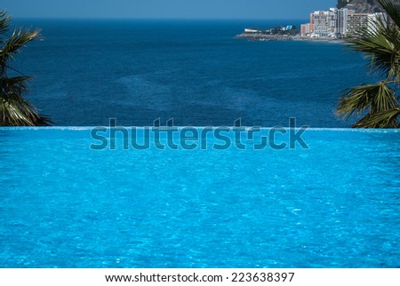 Pool and the sea, Andalusia, Spain