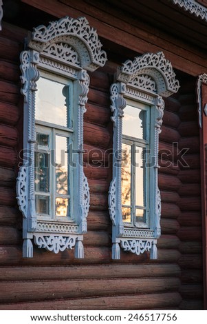 Image of village house windows with trims at  Palekh, Russia