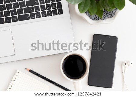 Similar – Image, Stock Photo Desk with laptop, notebook, pen in foreground