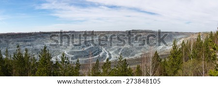 Open-cast mine panorama on mining operations, Asbestos, Ural Mountains, Russia