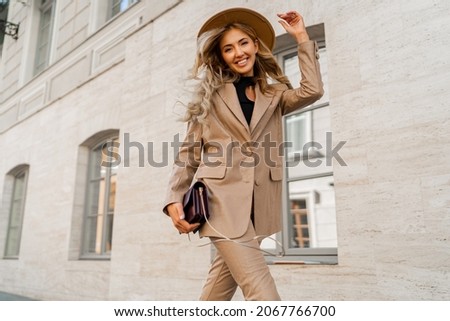 Similar – Image, Stock Photo Outdoor fashion photo of beautiful young woman surrounded by plants