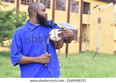Similar – Image, Stock Photo Handsome Black Man Holding Cup of Wine Smiling Widely Outdoors