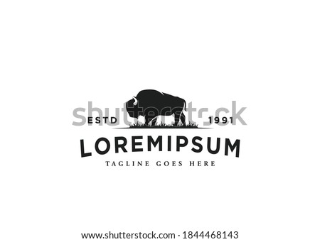 Long-Haired Buffalo Logo Design. Bison Bull Buffalo Angus Silhouette Vintage Retro Logo, Buffalo Breeders Vector Illustration.