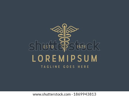 golden caduceus medical icon design. Illustration of golden caduceus medical. Vintage logo design vector line icon template