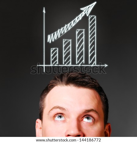 male head with rising bar chart, business concept