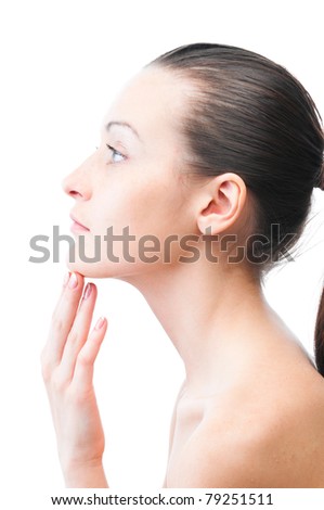 beautiful woman is touching her face, cut out from white