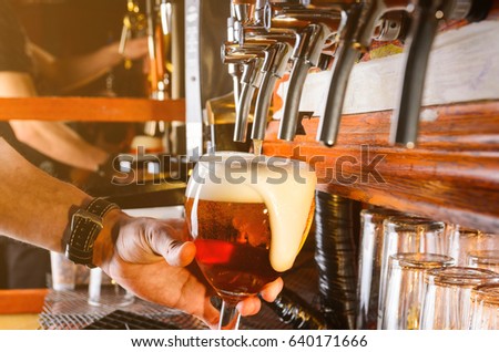 Similar – Foto Bild Kellnerin zapft Zapfhahn-Bier in einer Bar