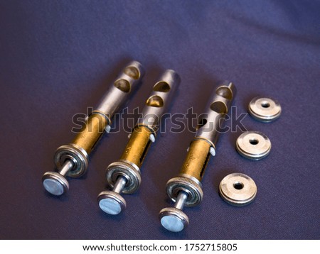 pistones trumpet's on a gray background. trumpet on grey. Stock fotó © 