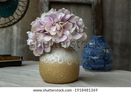 Flower vase or tabletop piece. Handbuilt ceramic vase with fun purples