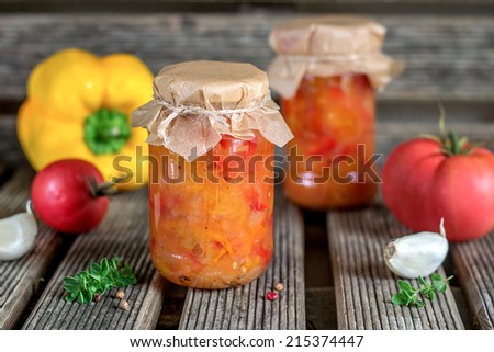 Canned tomato stew salad with sweet pepper Lecho/Lecso and vegetables. Shallow depth of field Stock fotó © 