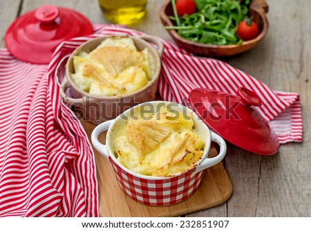 French traditional potato, ham and cheese meal Tartiflette. Selective focus