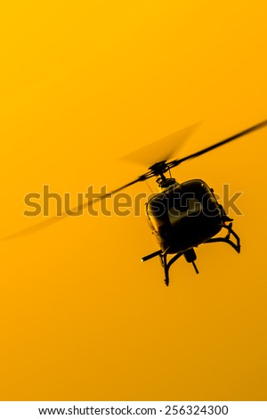 The patrol helicopter flying in the sky, soft focus motion blur