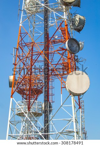 cellular communication towers on blue sky