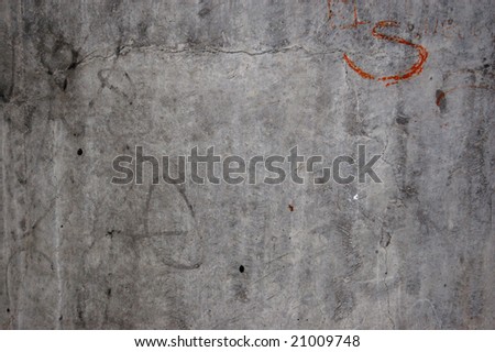 Urban concrete wall texture with writing
