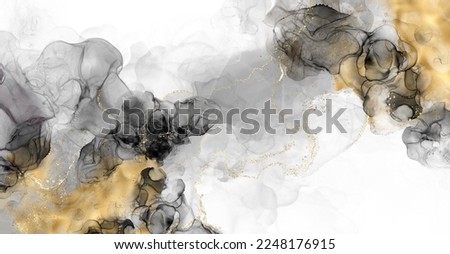 Luxury abstract fluid art painting in alcohol ink technique, mixture of black, gray and gold paints. Imitation of marble stone cut, glowing golden veins. Tender and dreamy design.
