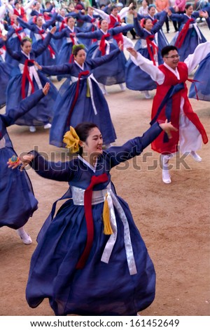 SEOUL KOREA MAY 12: People wearing traditional clothes are performing folk dance for celebration of Lotus Lantern Festival on may 12 2013 at  Jogyesa Temple, Seoul, Korea.