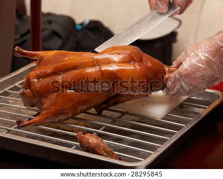 Beijing duck is one of the famous food in China.The whole duck be sliced into small  piece.