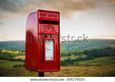 NORTH YORKSHIRE, UNITED KINGDOM - JULY 22 2015: A traditional Royal Mail post box in a rural setting.
