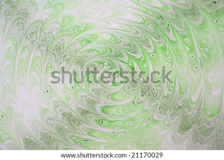 green spiral made of paint as background