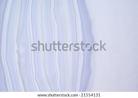 rolled white and silky cloth as background