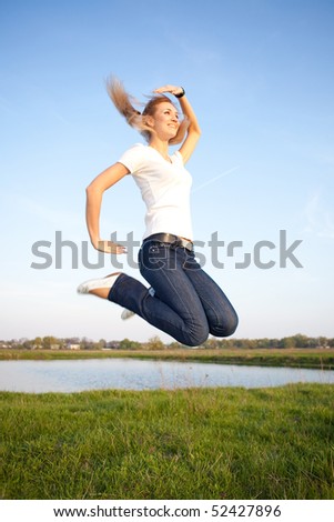 Woman Jump in the Field