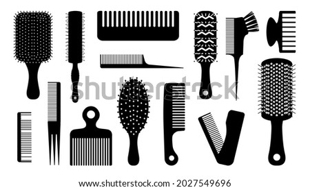 Black hair brush. Silhouettes of combs for haircut. Barber and hairdresser tools. Hairstyling or haircutting equipment. Beauty salon elements. Vector round and flat hairbrushes set