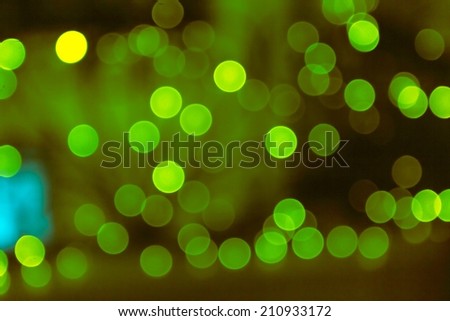 Lights Festive background. Abstract Christmas twinkled bright background with bokeh defocused lights