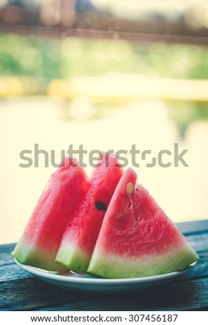 Watermelon on  wooden table vintage background