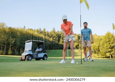 Similar – Image, Stock Photo Young couple playing with their soon at home.